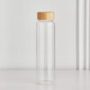cylindrical glass bottle wooden lid califora