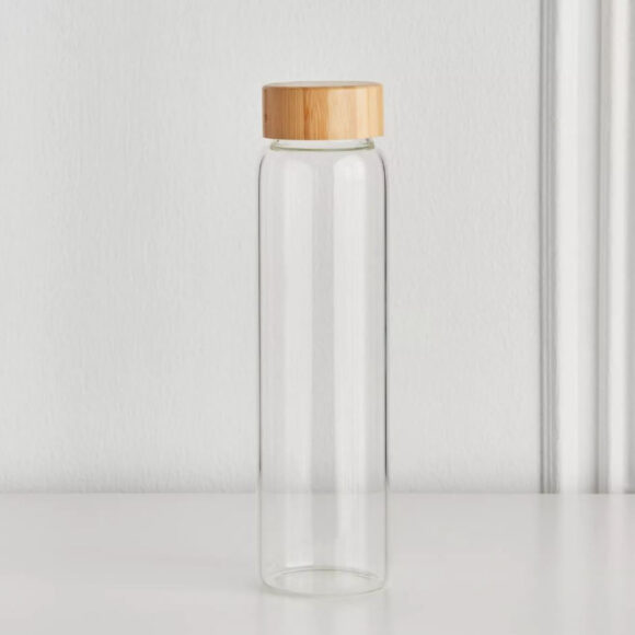 cylindrical glass bottle wooden lid califora